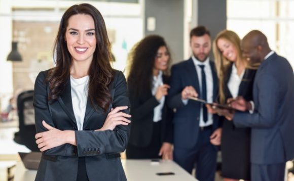 businesswoman-leader-modern-office-with-businesspeople-workin_1139-955